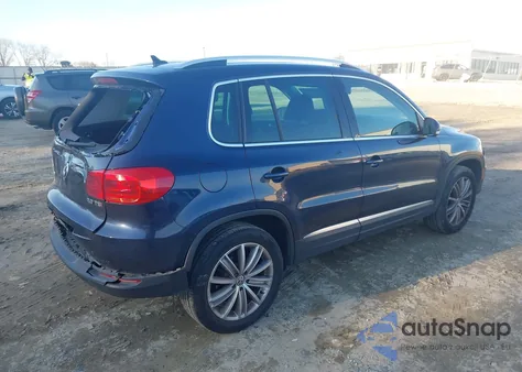 2014 Volkswagen Tiguan Sel z USA, uszkodzony, nr VIN WVGAV3AX7EW626003